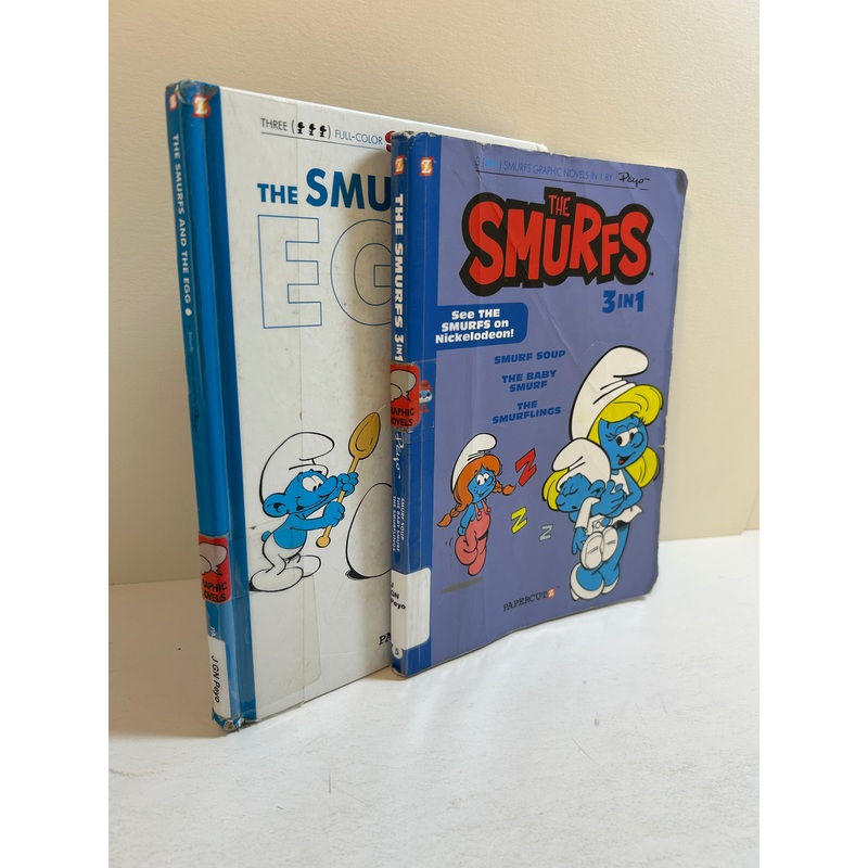 2 Vol Smurfs Graphic Novels:S & the Egg/3in1 S Soup/The Baby S/Smurflings Ex-Lib